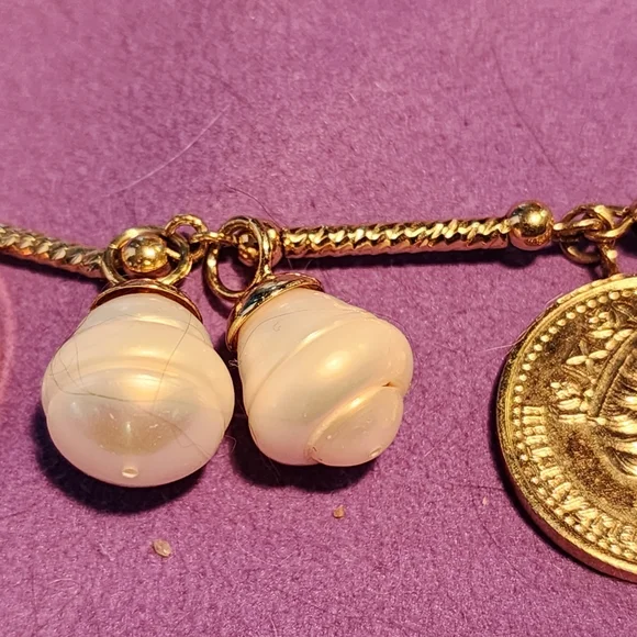 Queen Elizabeth part 2 gold bracelet
